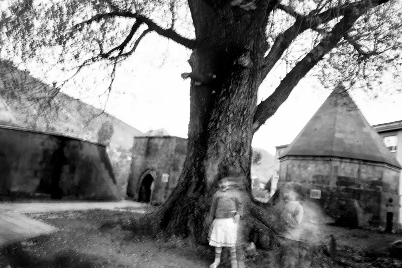 Kathryn Cook, Memory of Trees, 2008, children play in the courtyard of the old Ihlasiye Madresesi, or religious school, in Bitlis, Turkey.According to archive documents, Bitlis'spopulation was roughly half Armenian ©Katryn Cook/Agence Vu